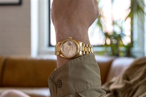 gold rolex day date on wrist